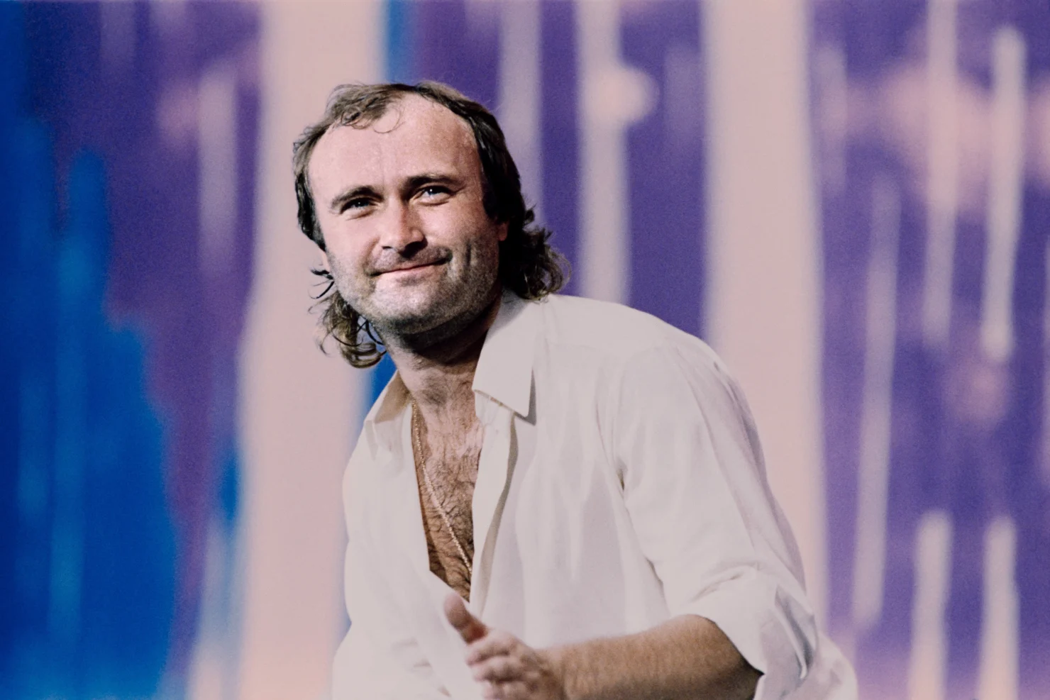 Phil Collins' Iconic Live Aid Performance: A Musical Triumph