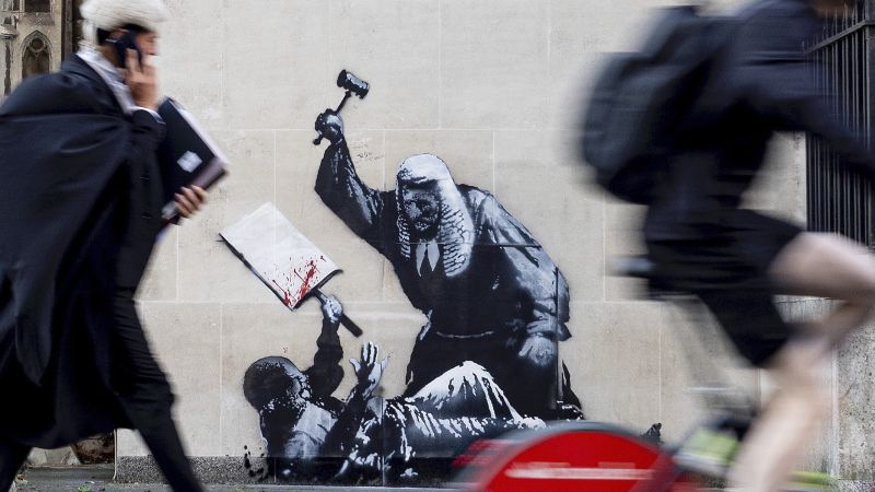 Controversial Banksy Mural Removed from London Courthouse Wall